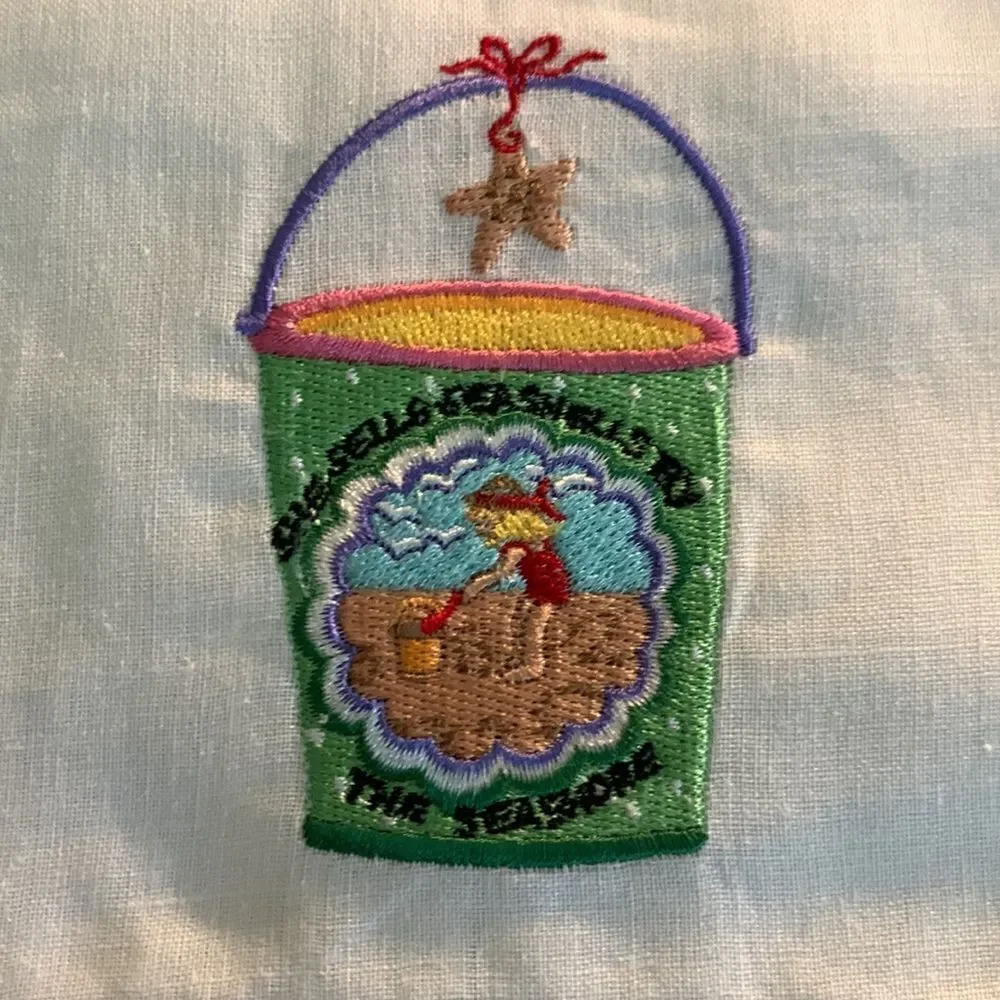 Beach theme tea towel